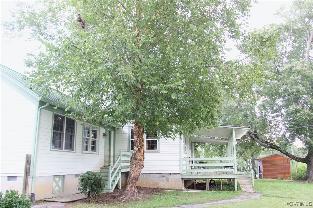 132 Carter Road Cumberland, VA 23040 - Photo 3 of 45 a front view of a house with a yard