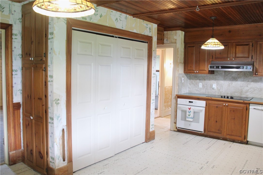 132 Carter Road Cumberland, VA 23040 - Photo 32 of 45 a kitchen with stainless steel appliances granite countertop a sink and a refrigerator