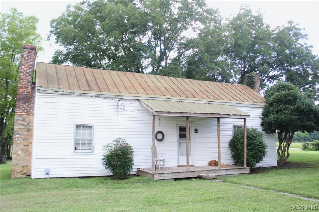 132 Carter Road Cumberland, VA 23040 - Photo 7 of 45 front view of a house with a yard