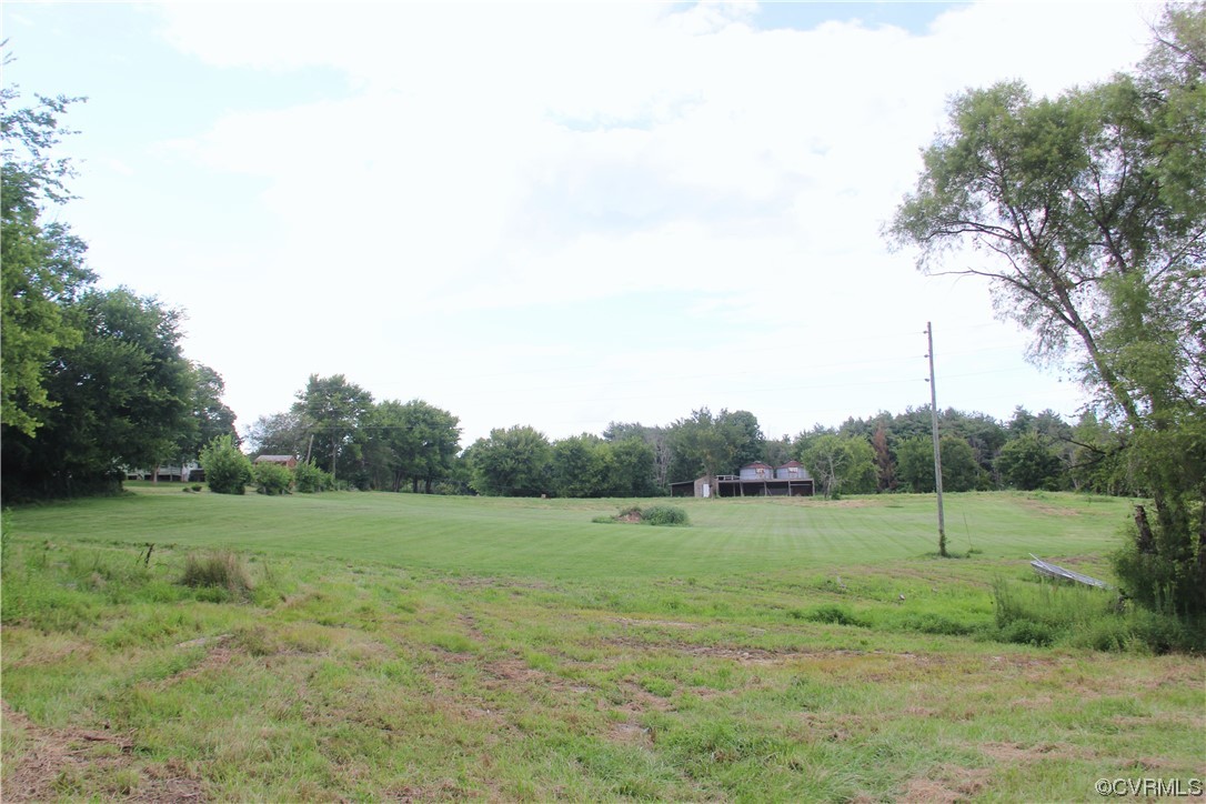 132 Carter Road Cumberland, VA 23040 - Photo 9 of 45 a view of a field with trees in the background