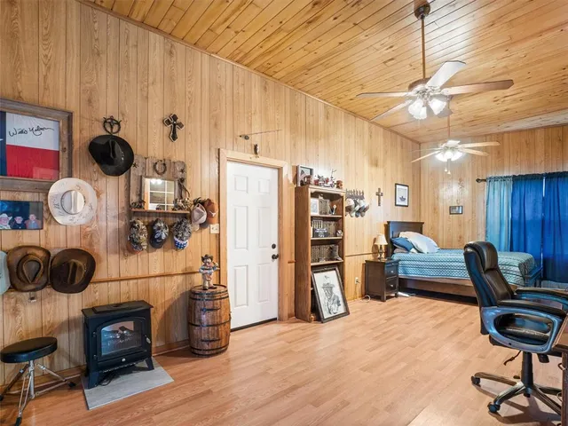 a view of workspace with wooden floor