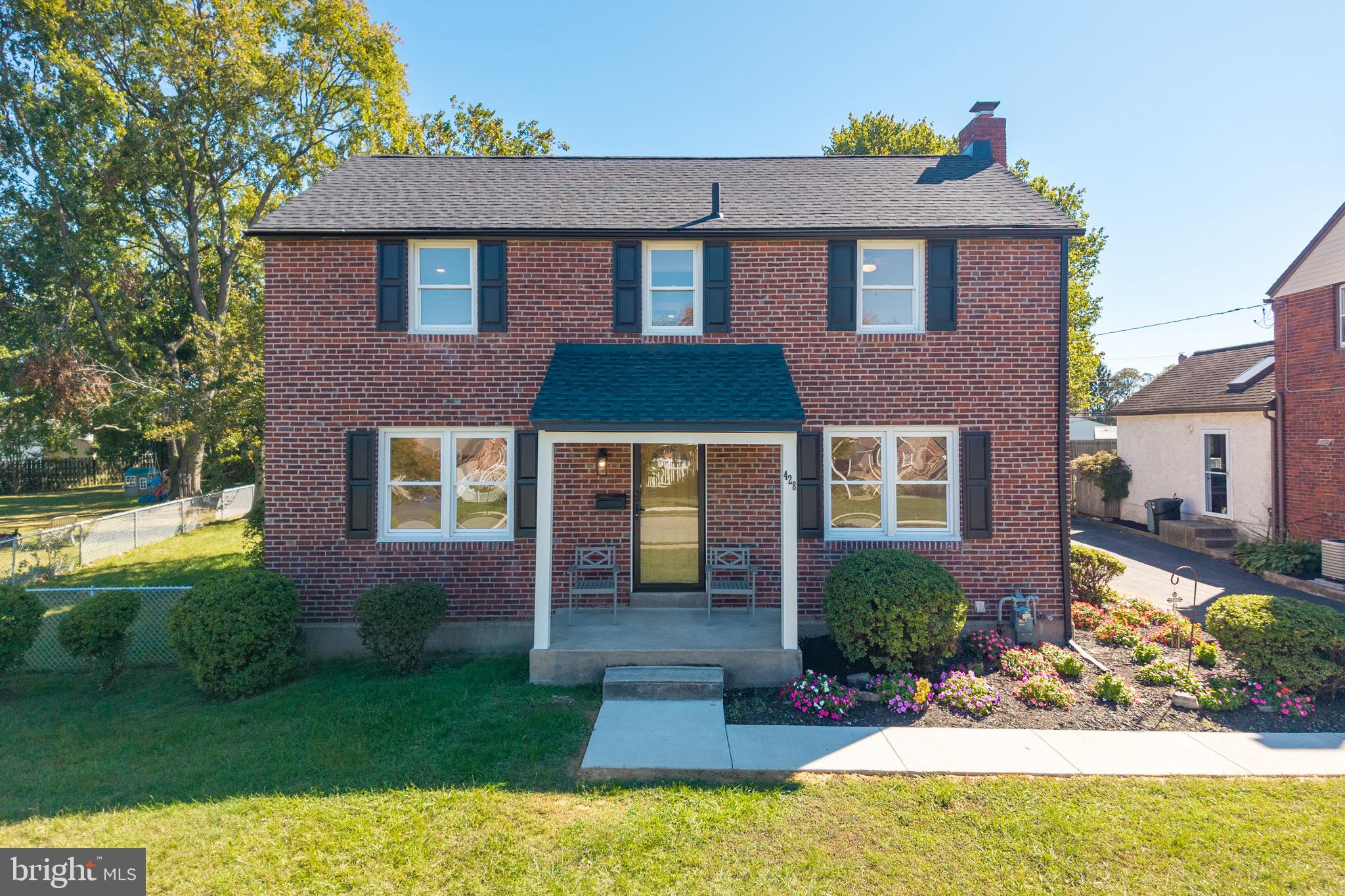 428 Adair Road Holmes, PA 19043 - Photo 1 of 59 a front view of a house with garden