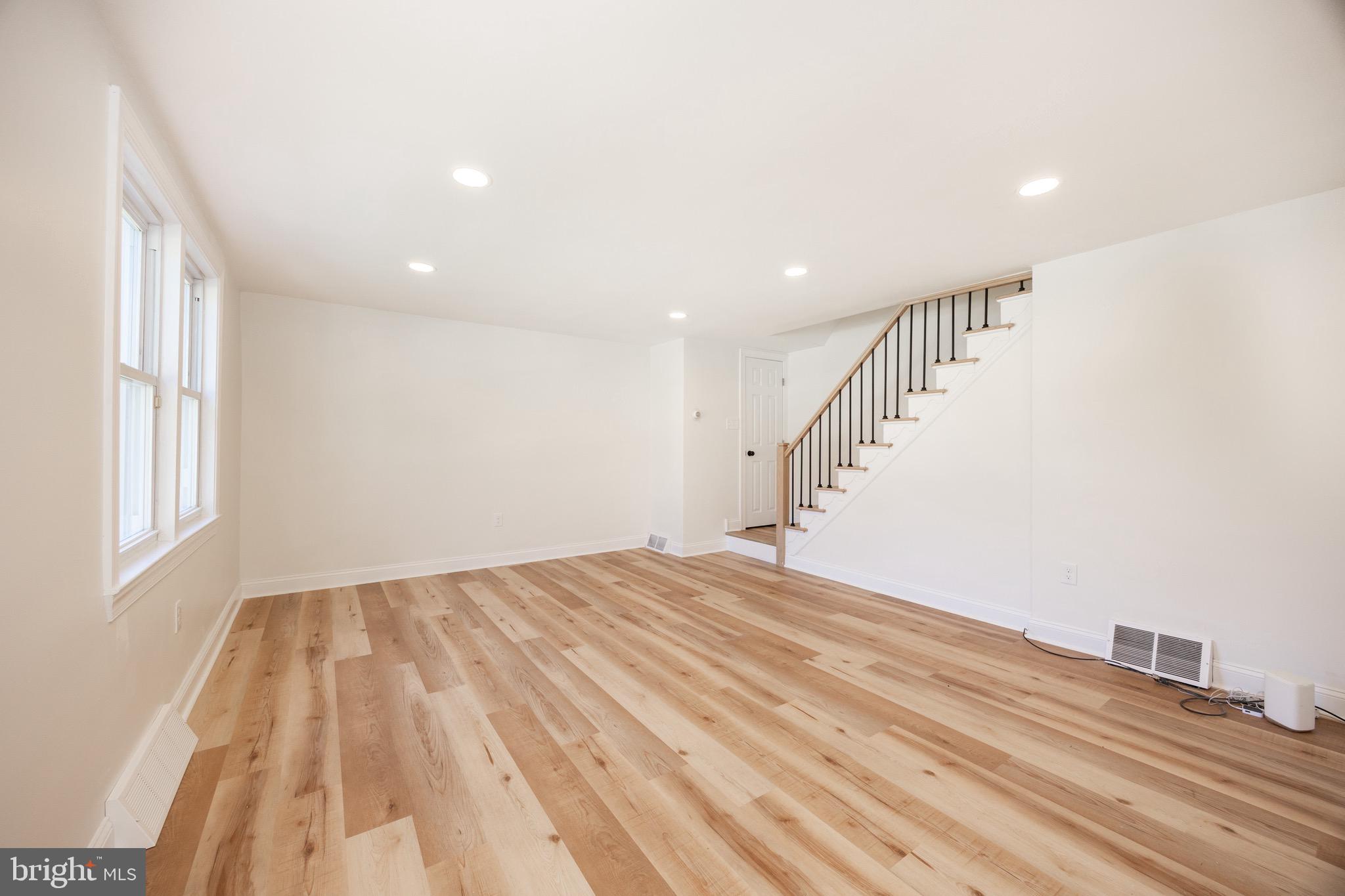 428 Adair Road Holmes, PA 19043 - Photo 11 of 59 a view of empty room with wooden floor and fan