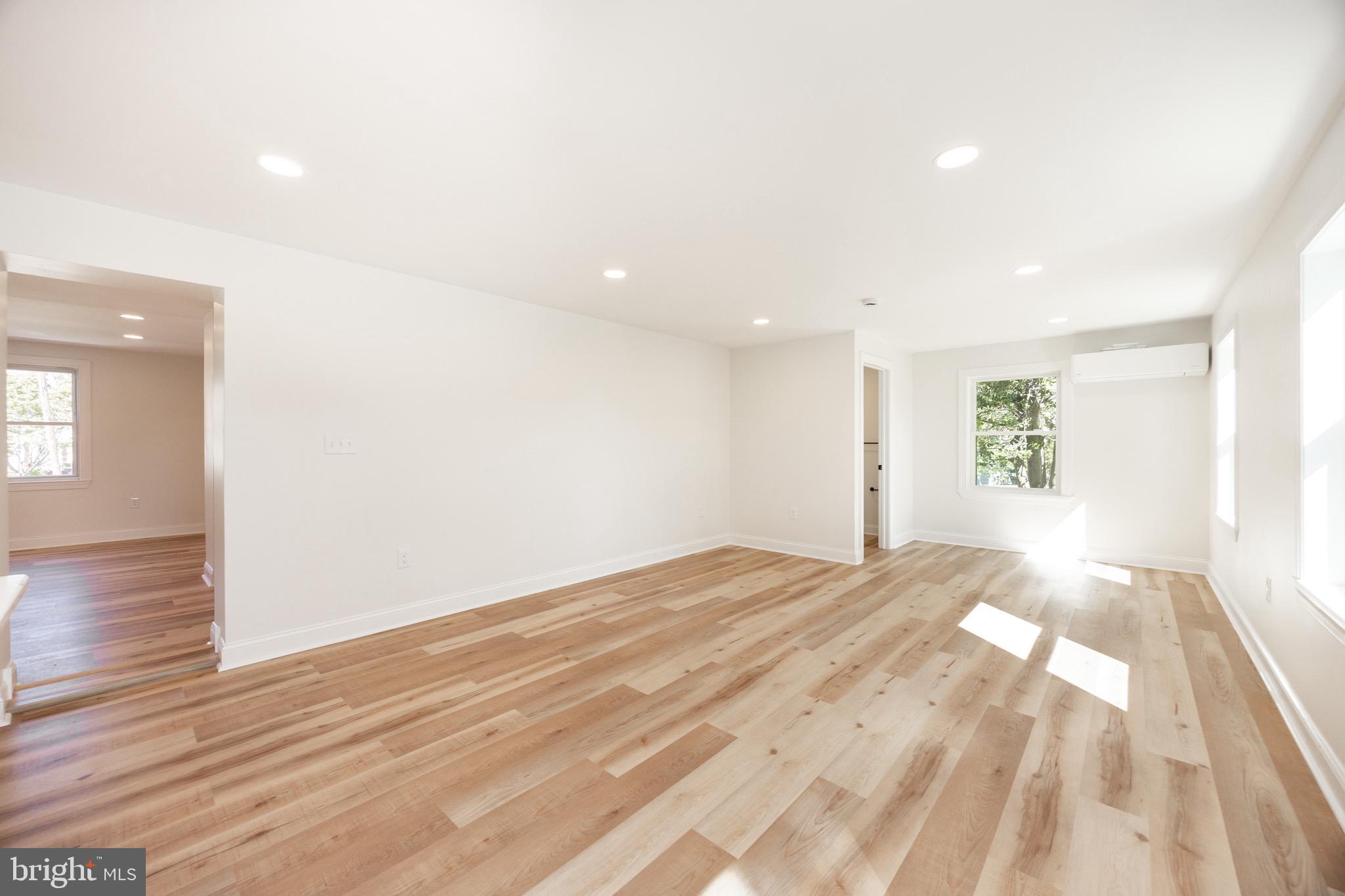 428 Adair Road Holmes, PA 19043 - Photo 19 of 59 a view of empty room with wooden floor and fan
