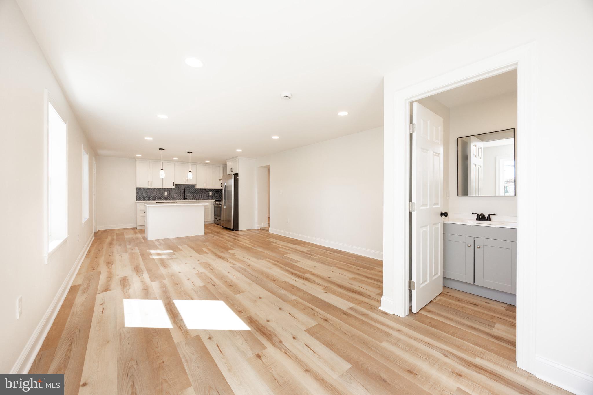 428 Adair Road Holmes, PA 19043 - Photo 20 of 59 Living Room Kitchen Addition