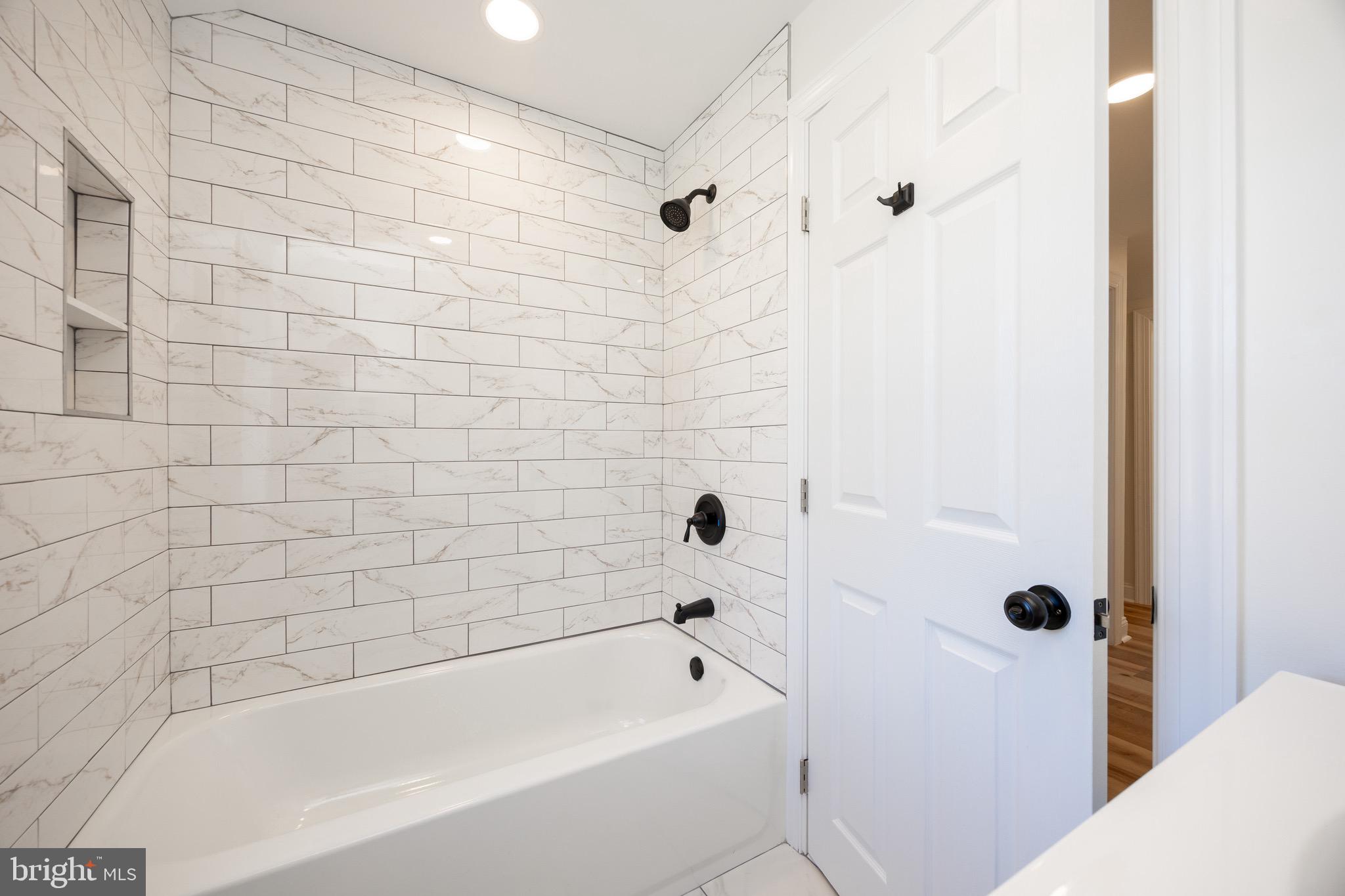 428 Adair Road Holmes, PA 19043 - Photo 30 of 59 a bathroom with a bathtub