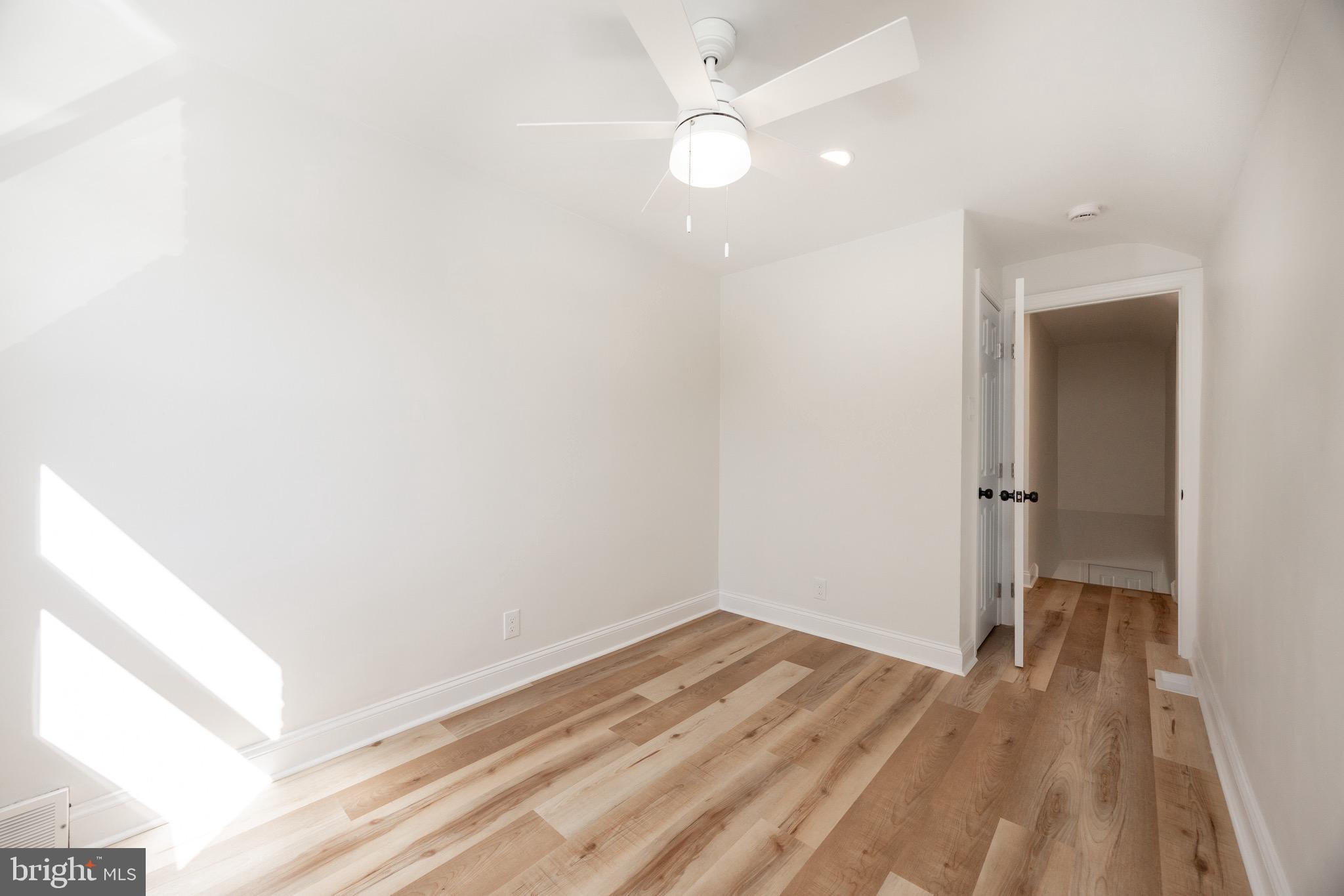 428 Adair Road Holmes, PA 19043 - Photo 36 of 59 wooden floor in an empty room