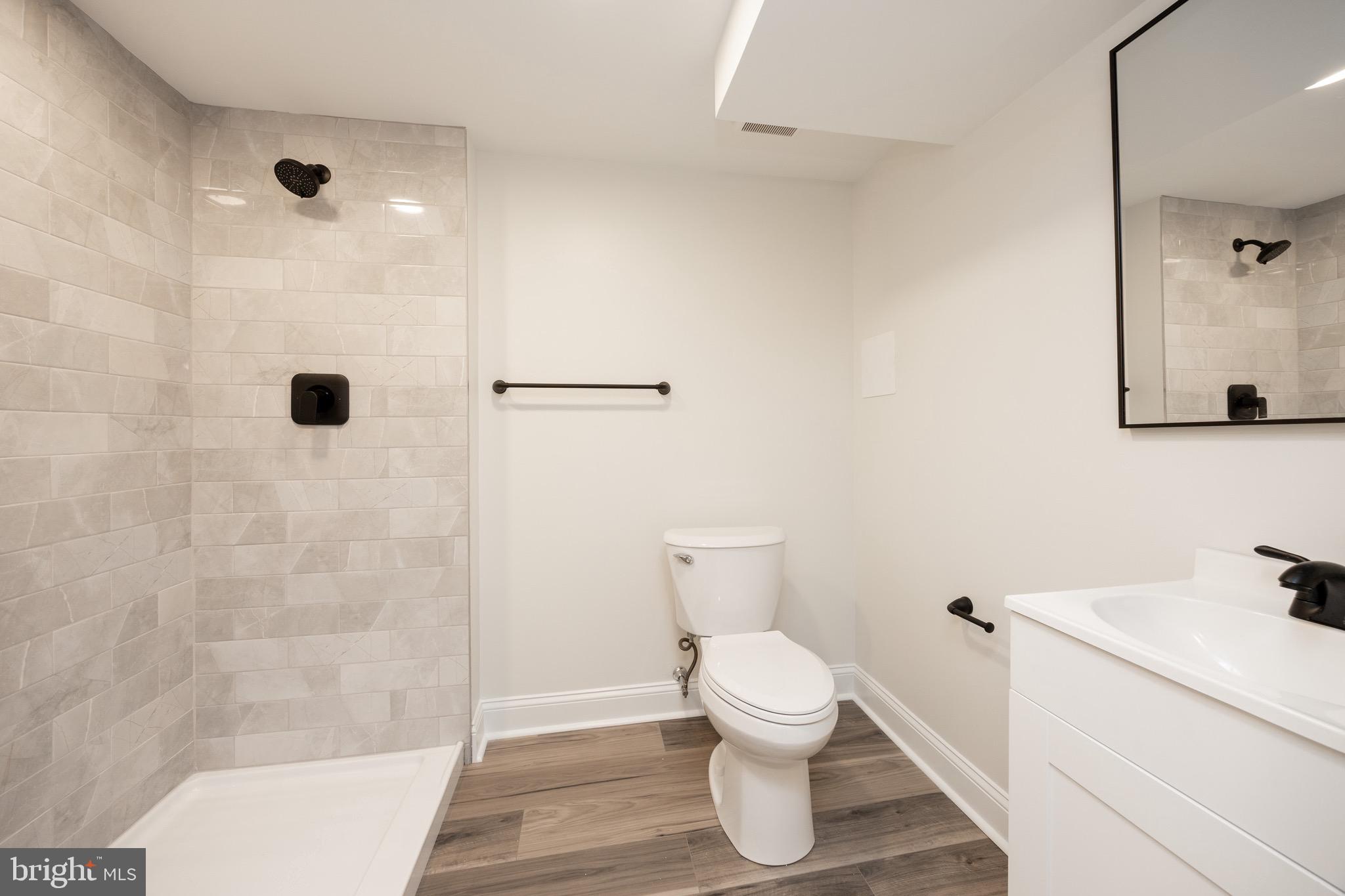428 Adair Road Holmes, PA 19043 - Photo 43 of 59 a bathroom with a toilet and a shower