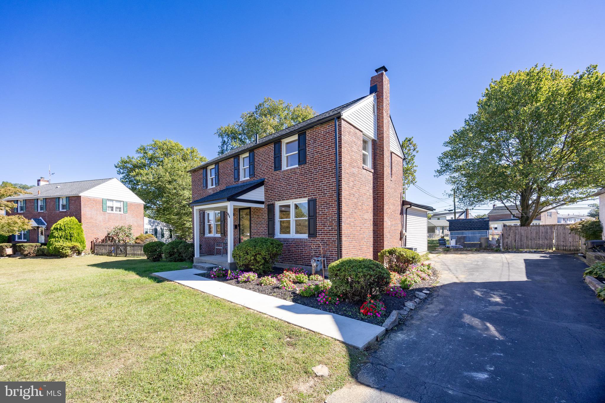 428 Adair Road Holmes, PA 19043 - Photo 52 of 59 a front view of a house with a yard