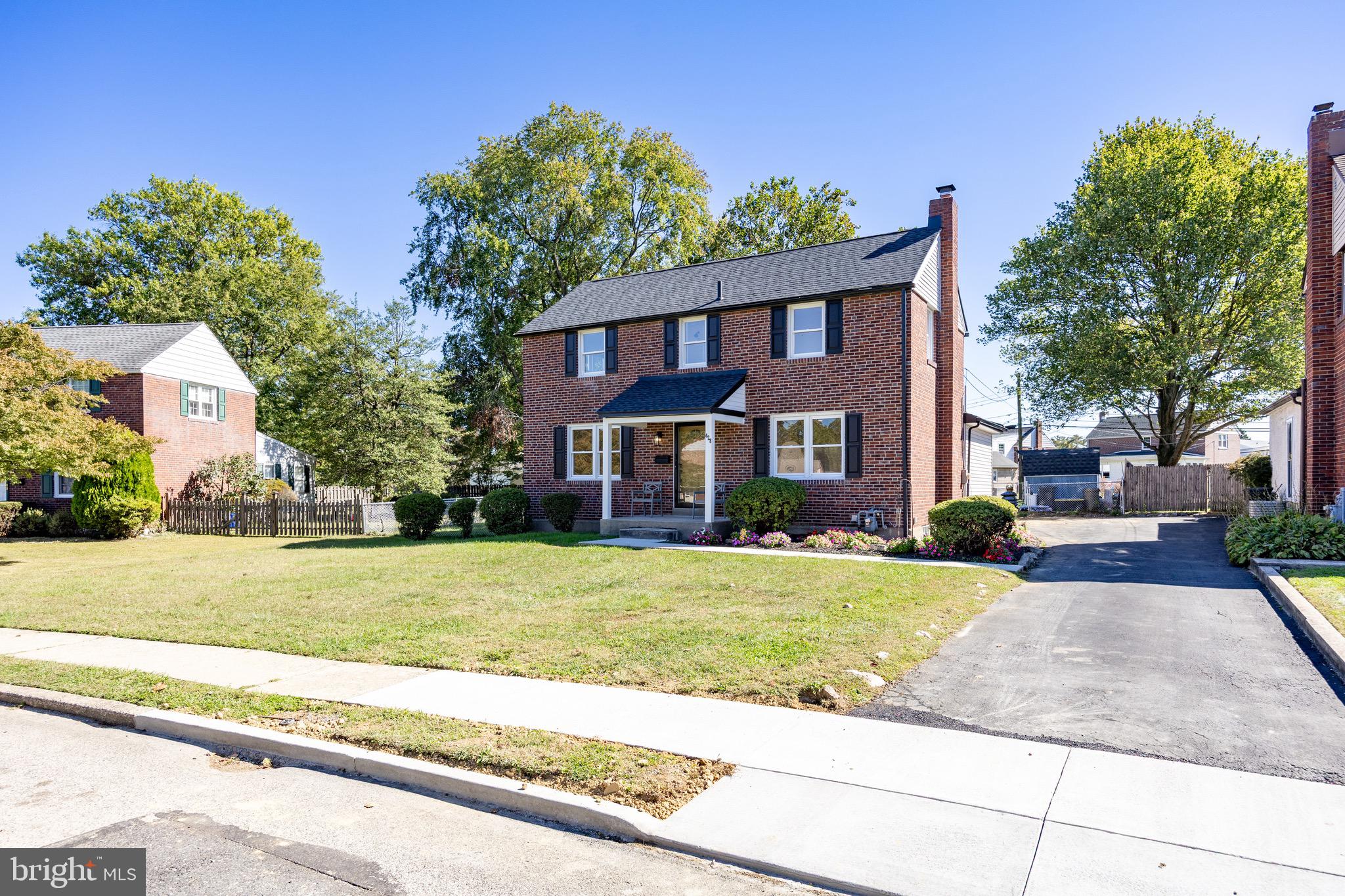 428 Adair Road Holmes, PA 19043 - Photo 53 of 59 a front view of a house with a yard