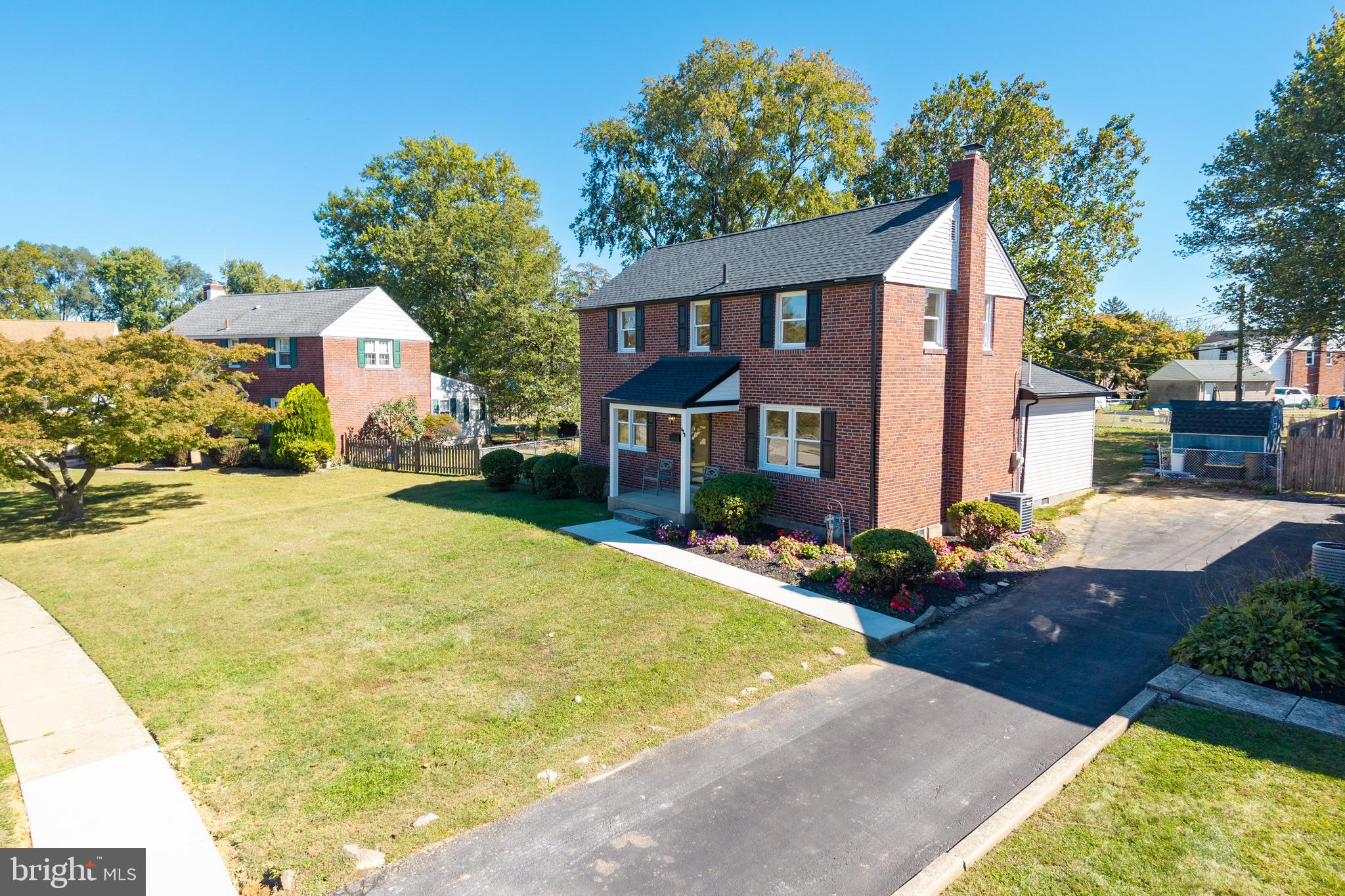 428 Adair Road Holmes, PA 19043 - Photo 7 of 59 a front view of a house with a yard