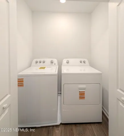 a utility room with dryer and washer
