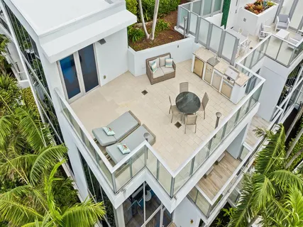 a view of a porch and garden