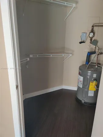 a view of a city from a corridor