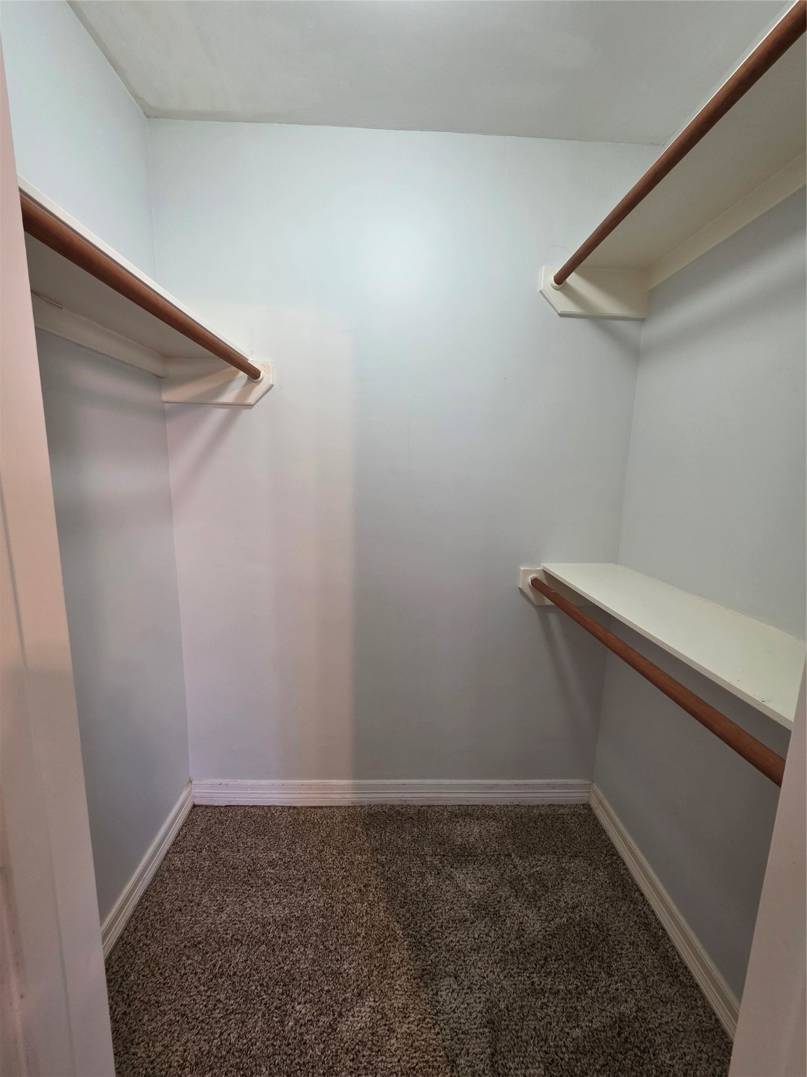 1714 Roy Street Houston, TX 77007 - Photo 12 of 35 a view of small space with empty racks on the wall