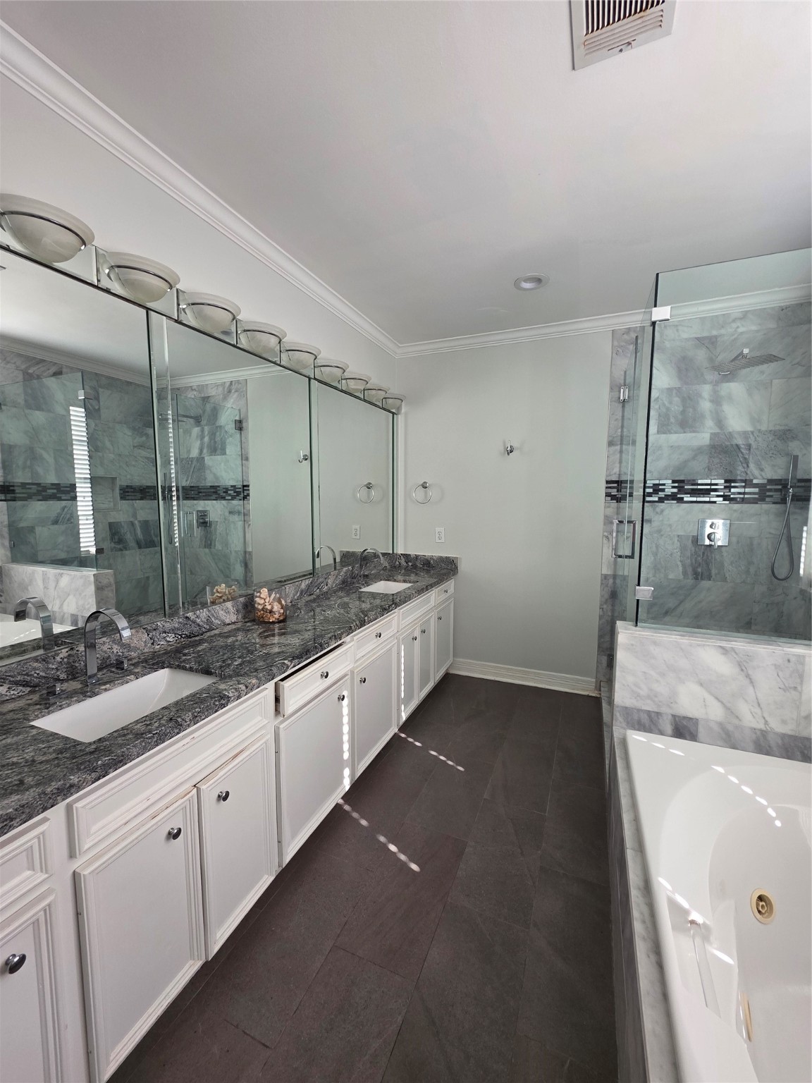 1714 Roy Street Houston, TX 77007 - Photo 20 of 35 a bathroom with a sink and a mirror