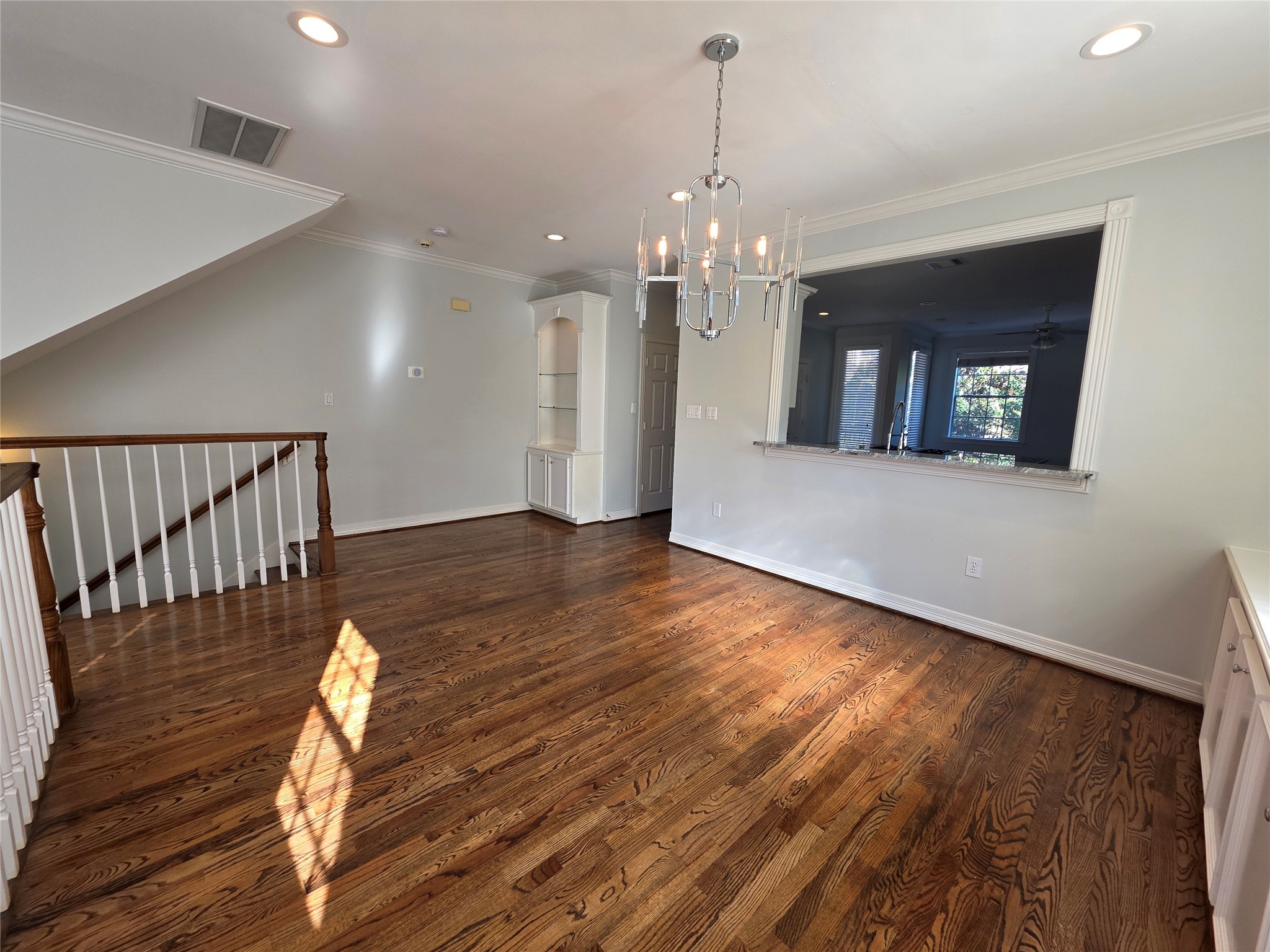 1714 Roy Street Houston, TX 77007 - Photo 24 of 35 a view of a room with wooden floor chandelier and entryway