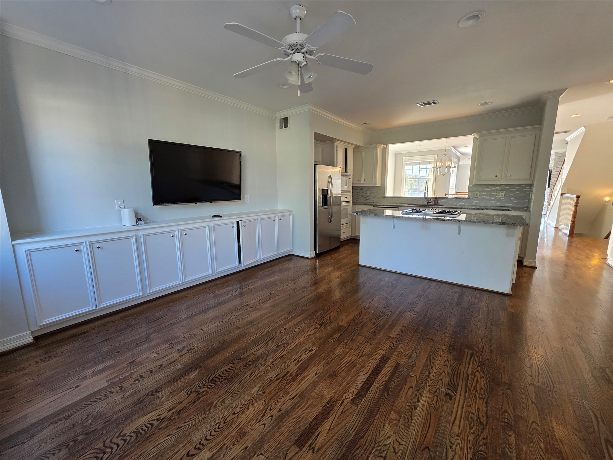 1714 Roy Street Houston, TX 77007 - Photo 26 of 35 a living room with stainless steel appliances wooden floors and living room view