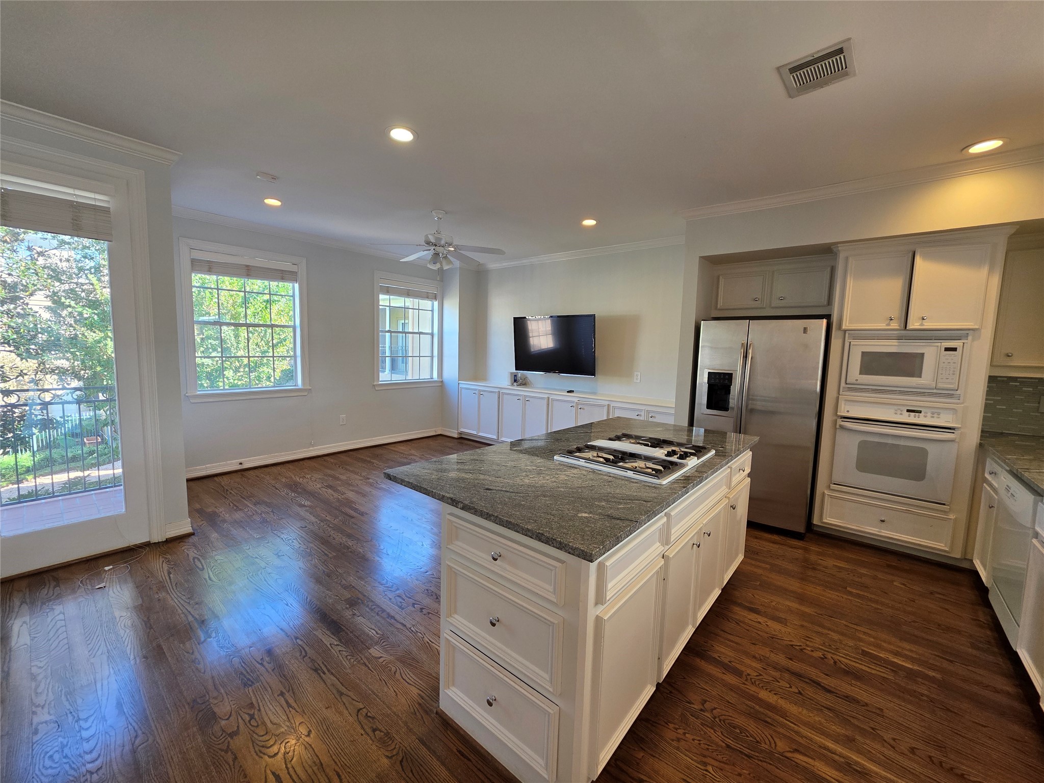1714 Roy Street Houston, TX 77007 - Photo 6 of 35 a kitchen with wooden floors and appliances