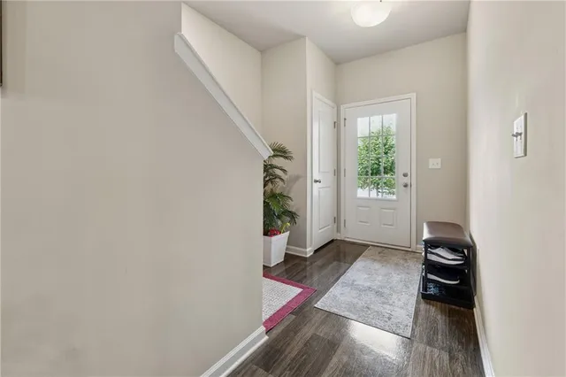 a view of entryway with furniture and a window