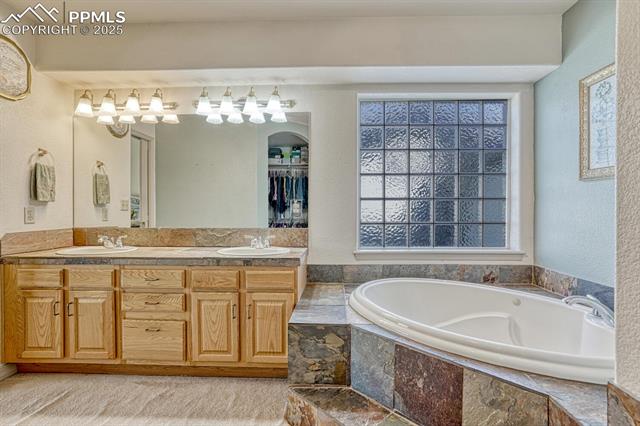 11455 Dallas Road Peyton, CO 80831 - Photo 28 of 50 Main Level Primary Bathroom