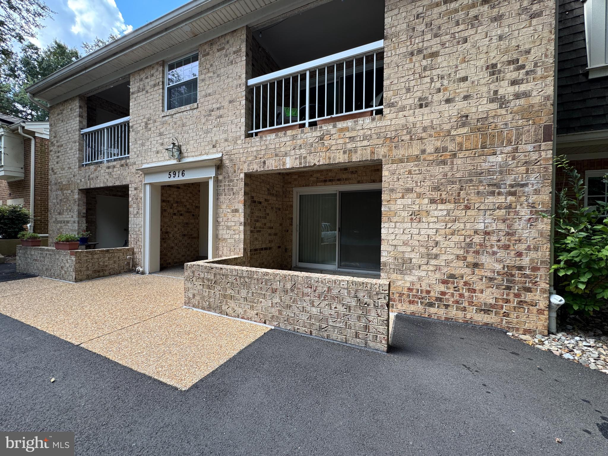 5916 Cove Landing Road, Unit 204 Burke, VA 22015 - Photo 1 of 20 a view of front door
