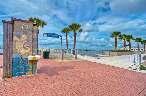 a view of a swimming pool with a deck