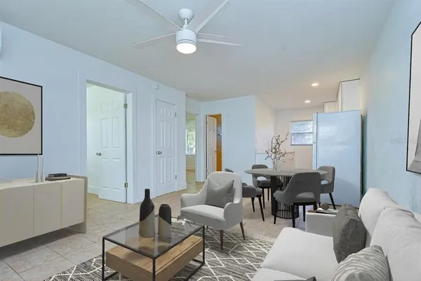 a living room with furniture and a window