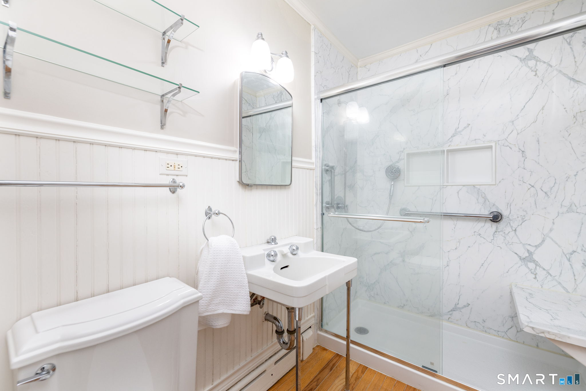 6 Keighley Pond Road East Hampton, CT 06456 - Photo 20 of 40 The full bathroom was remodeled with walk-in shower, and retains the charm of beadboard details, crown moldings, and hardwood floors. It is located on the main floor.