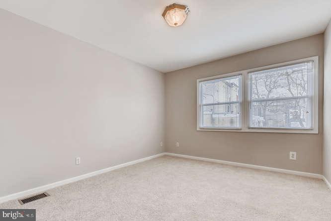 768 Carroll Street Baltimore, MD 21230 - Photo 14 of 26 an empty room with a window