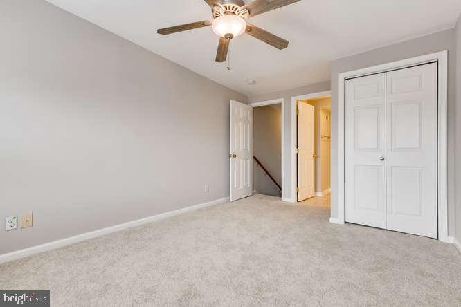 768 Carroll Street Baltimore, MD 21230 - Photo 20 of 26 a view of an empty room and chandelier fan