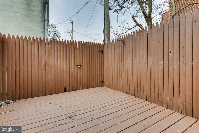 768 Carroll Street Baltimore, MD 21230 - Photo 25 of 26 a view of a wooden door