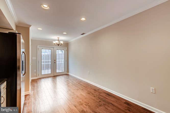 768 Carroll Street Baltimore, MD 21230 - Photo 7 of 26 a view of entryway with wooden floor