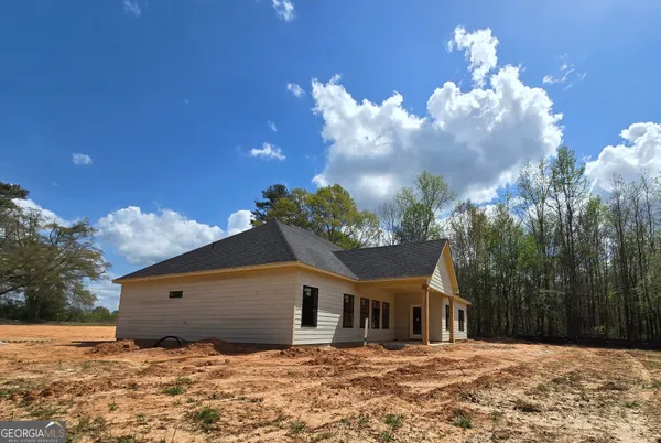 a view of house with outdoor space