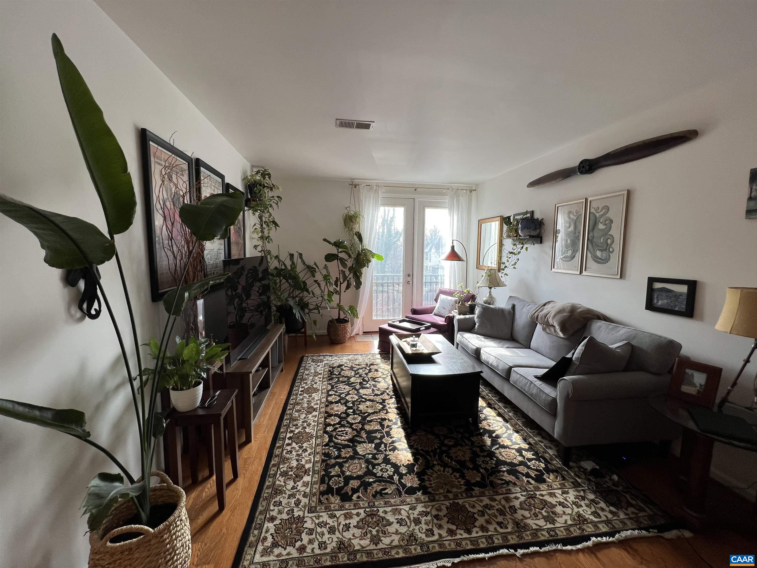740 Walker Square, Unit 3A Charlottesville, VA 22903 - Photo 4 of 29 a living room with furniture fireplace and rug
