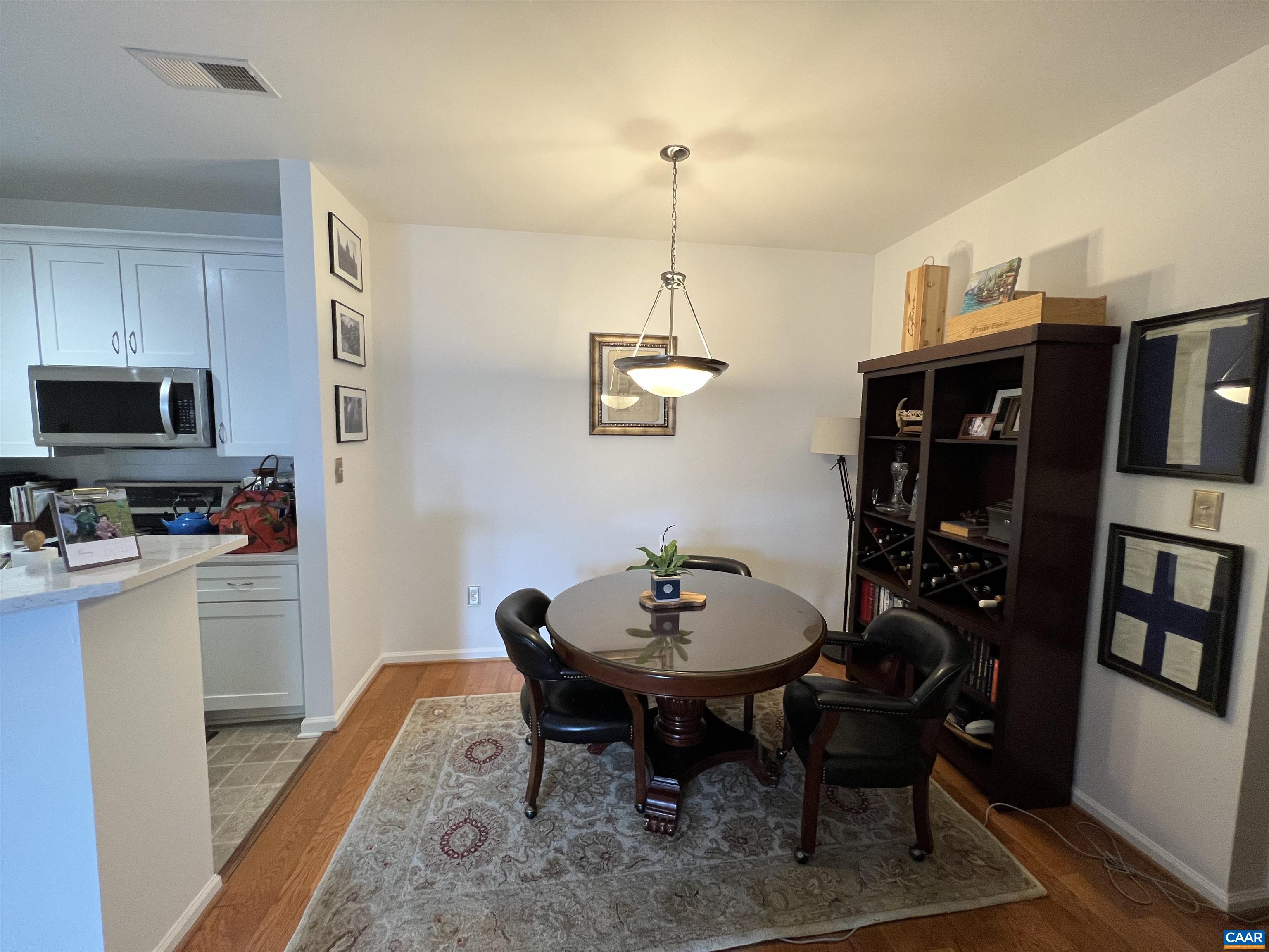 740 Walker Square, Unit 3A Charlottesville, VA 22903 - Photo 5 of 29 a view of a dining room with furniture