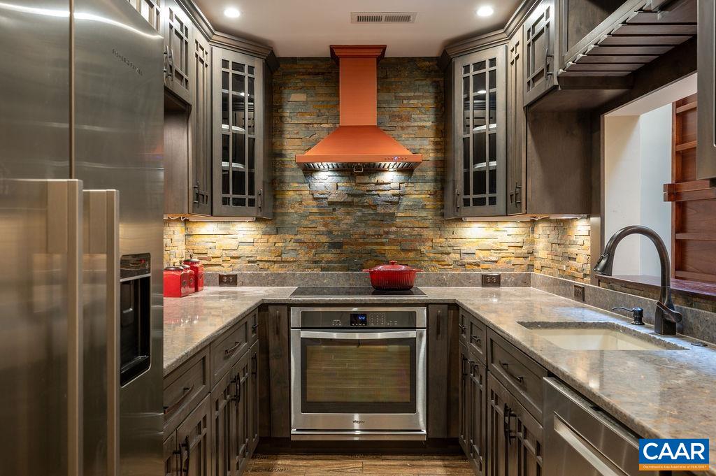 116 Blithe Court Charlottesville, VA 22901 - Photo 10 of 37 Renovated kitchen has all modern appliances, granite counters, under cabinet lighting, ...