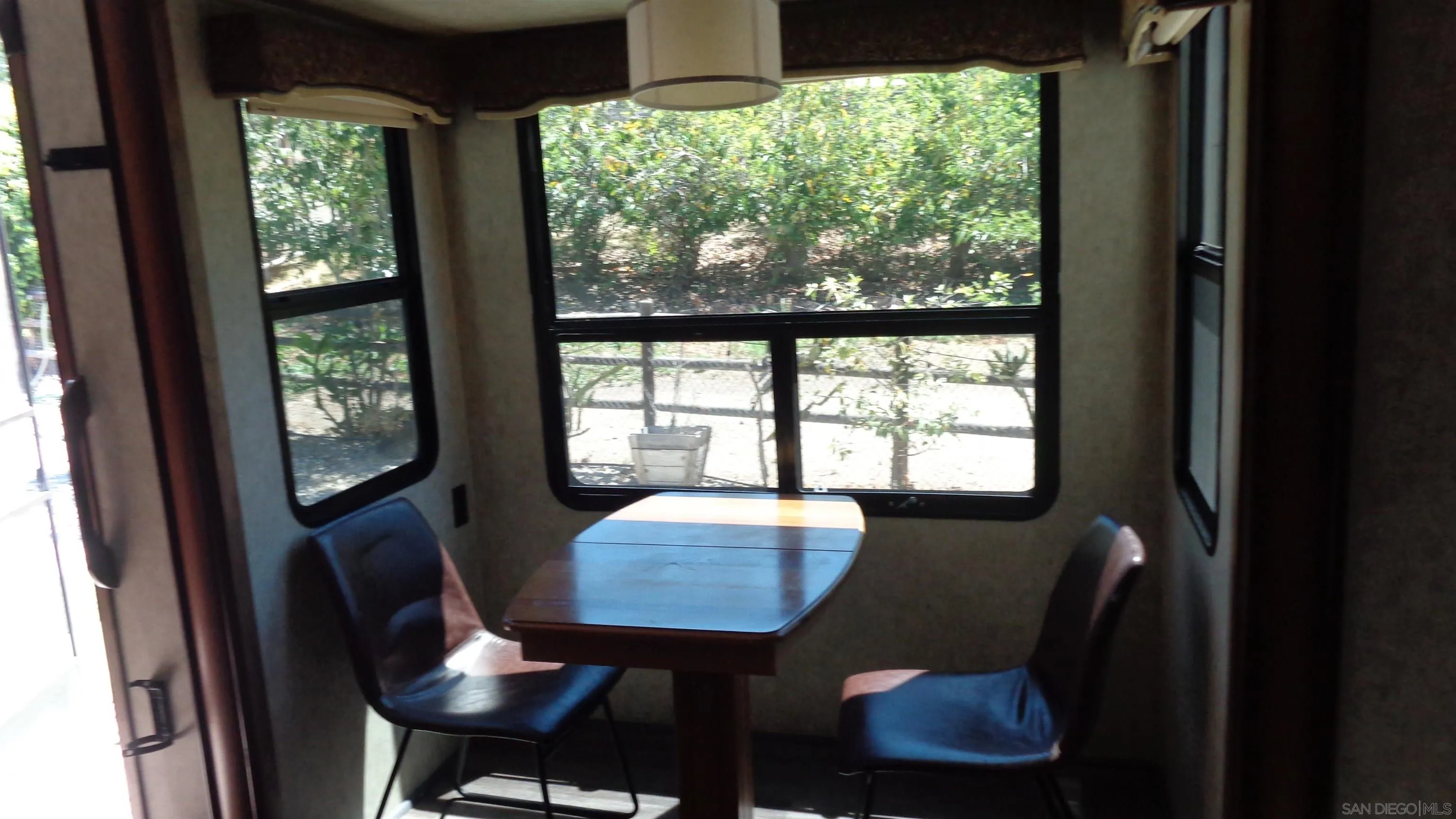 762 Taylor Street Vista, CA 92084 - Photo 13 of 13 a view of a room with a large window and chairs
