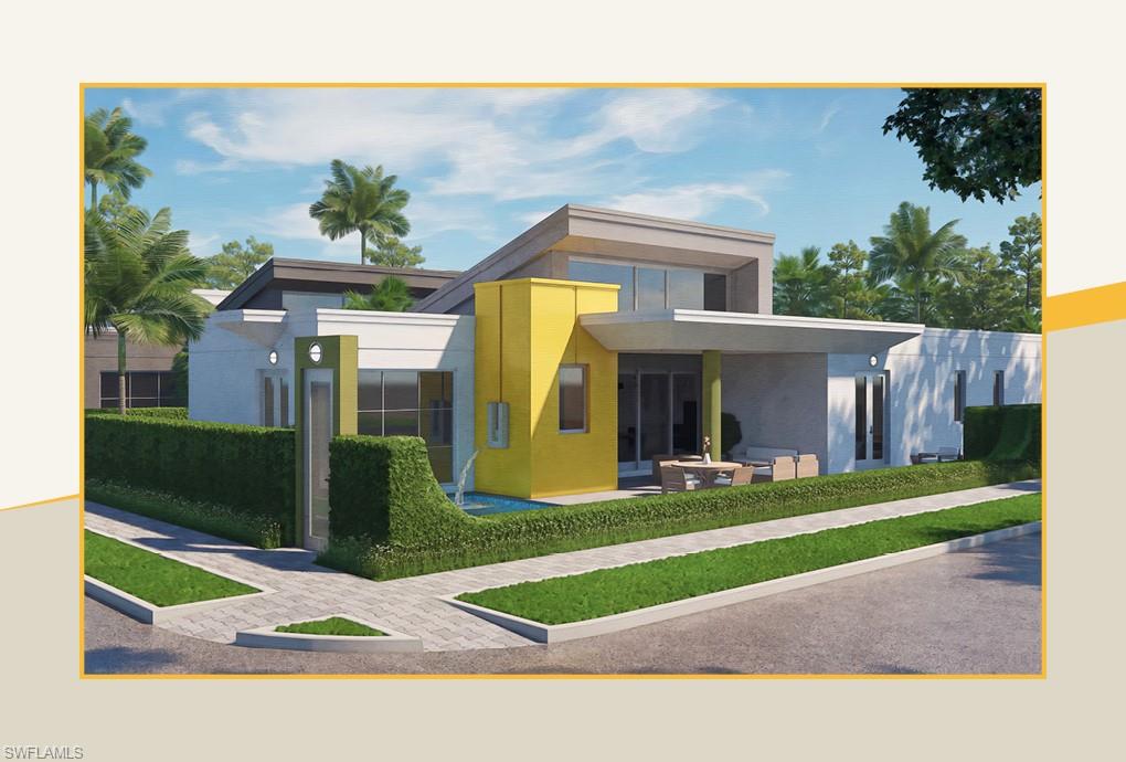 3724 Grove Circle Naples, FL 34112 - Photo 1 of 14 a front view of a house with garden