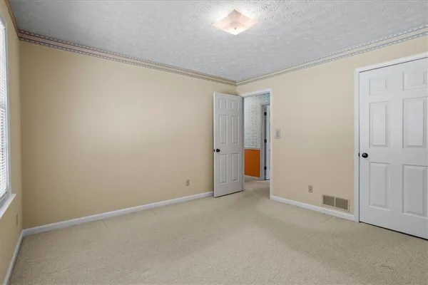 an empty room with an entryway