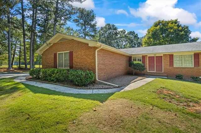 a house view with a garden space