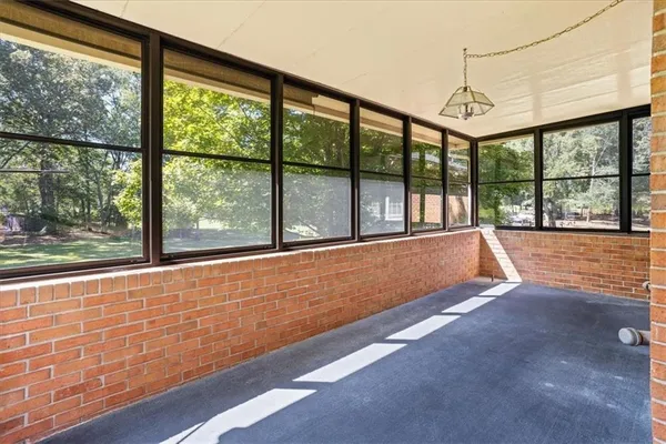 a living room with large windows