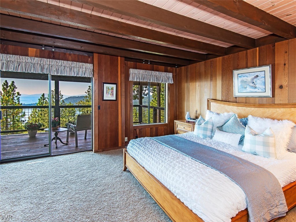816 Toni Court Incline Village, NV 89451 - Photo 12 of 22 a bedroom with a bed and a large window