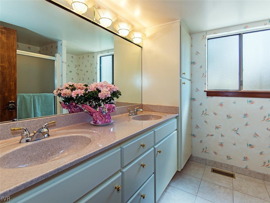 816 Toni Court Incline Village, NV 89451 - Photo 17 of 22 a bathroom with a sink and a mirror