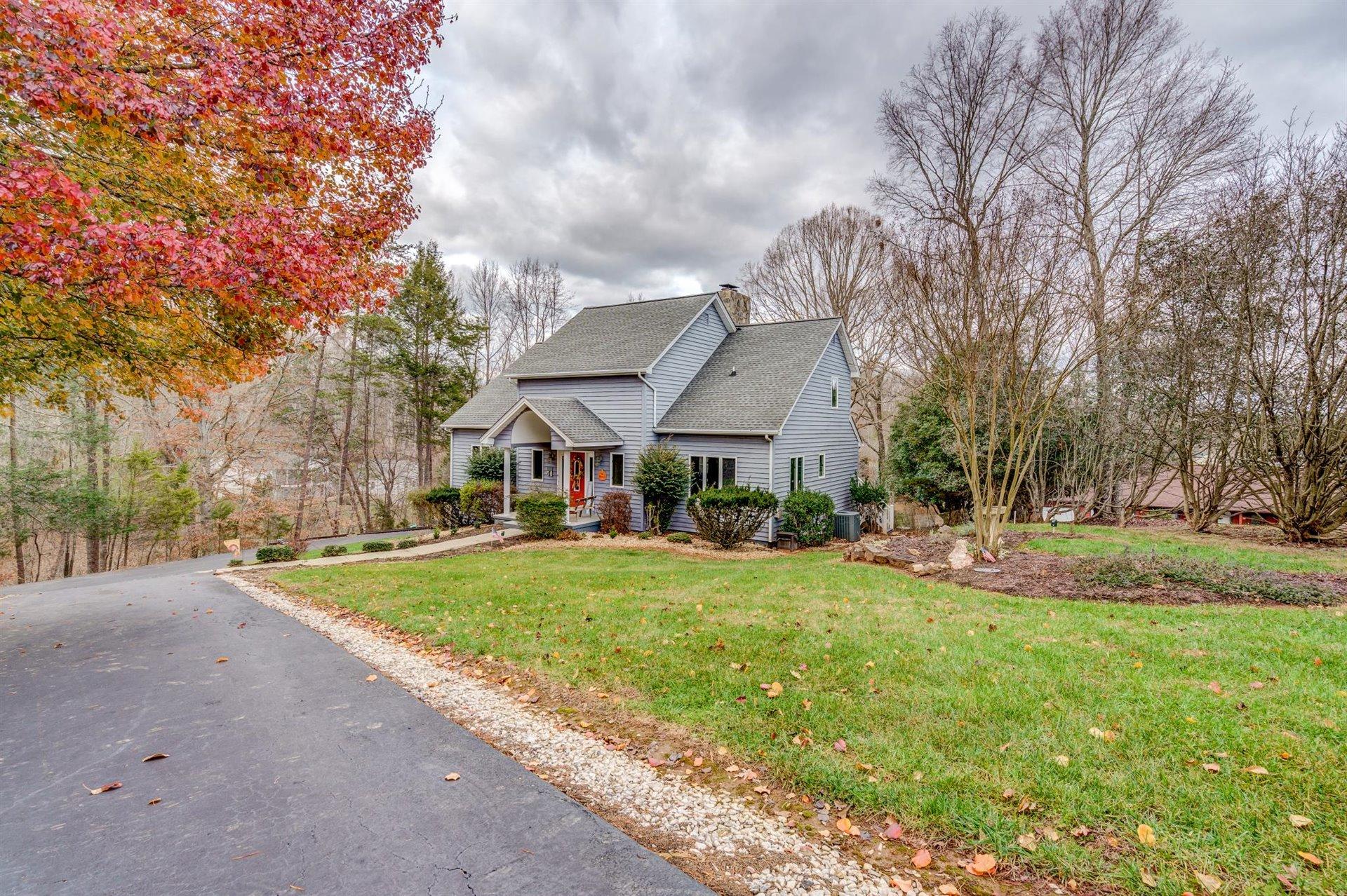 51 Cedar Ridge Circle Union Hall, VA 24176 - Photo 3 of 63 a front view of house with yard and trees
