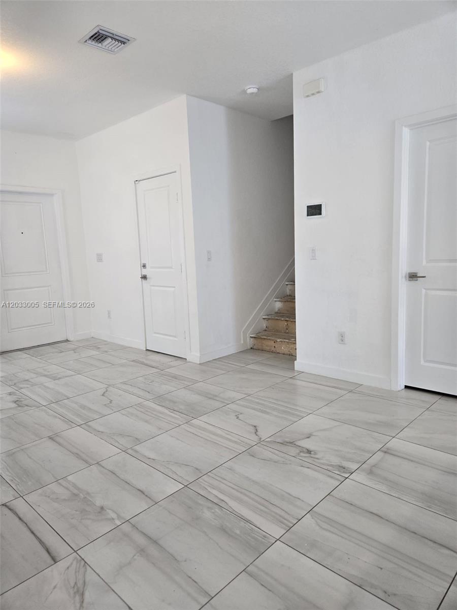 862 Southeast 17 Street, Unit 862 Homestead, FL 33034 - Photo 12 of 39 an empty room with a empty space