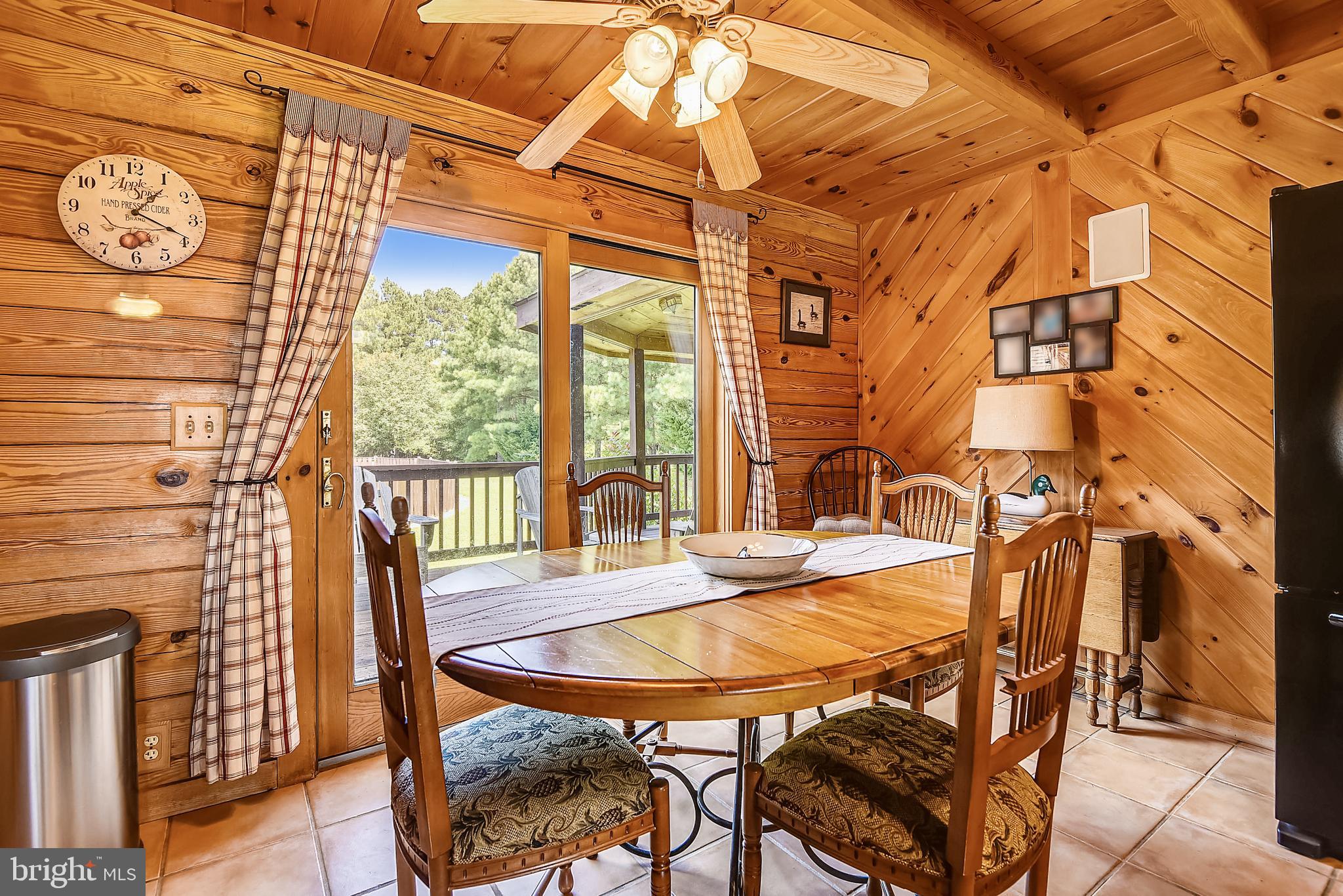25758 Edgeview Road Royal Oak, MD 21662 - Photo 13 of 29 Dining area with access to large, back deck