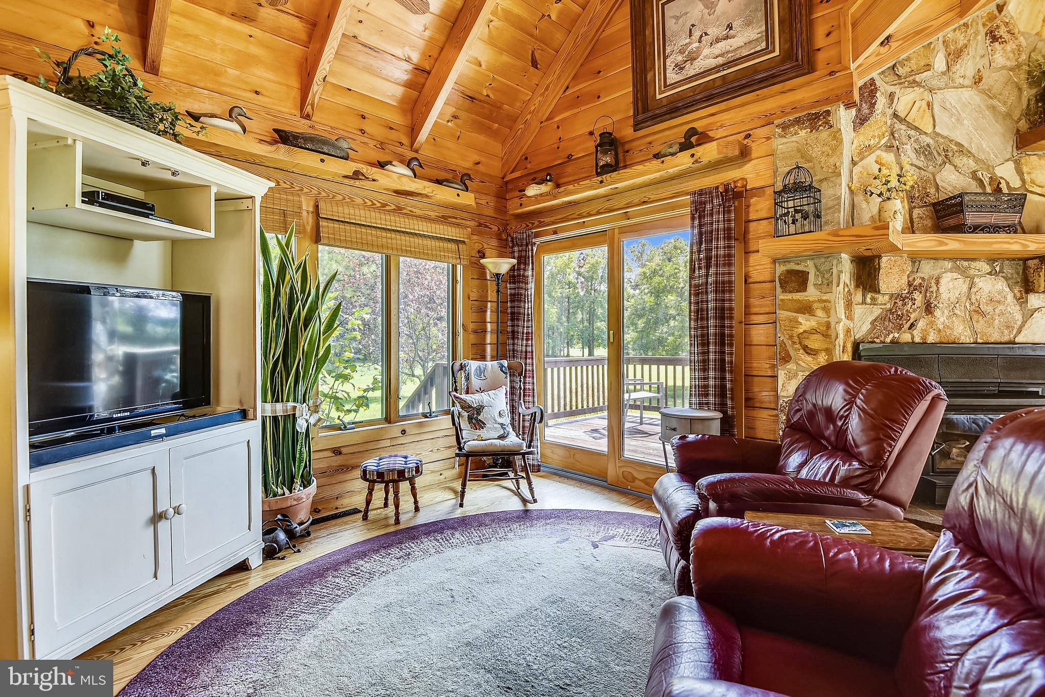 25758 Edgeview Road Royal Oak, MD 21662 - Photo 8 of 29 Family room with access to deck