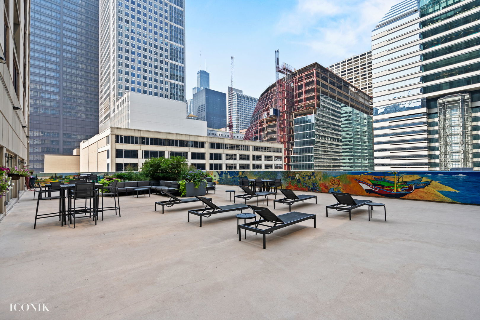 200 North Dearborn Street, Unit 1007 Chicago, IL 60601 - Photo 16 of 18 a view of a patio with swimming pool table and chairs
