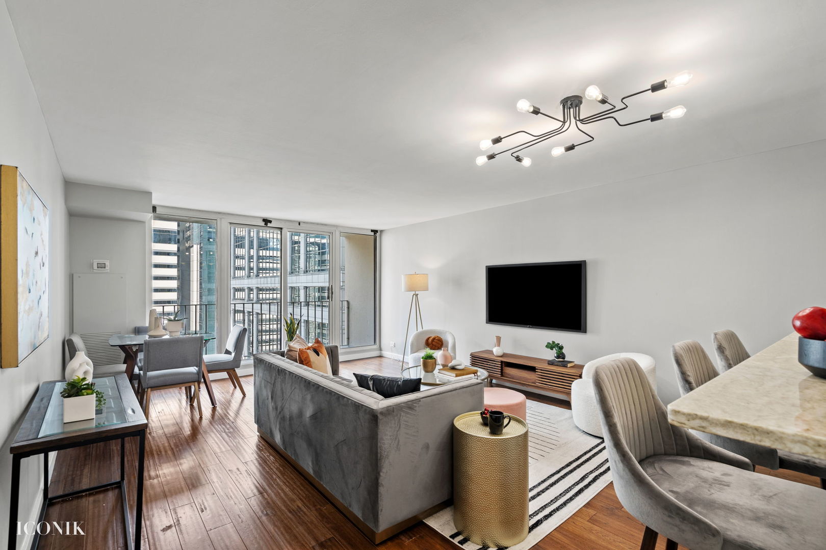 200 North Dearborn Street, Unit 1007 Chicago, IL 60601 - Photo 3 of 18 a work room with furniture wooden floor and a window